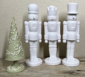 Three White Ceramic Nutcrackers & Green Textured Christmas Tree Decor