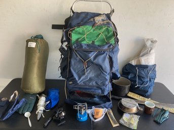 Backpacking Backpack With Various Camping Supplies