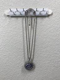 Silver Colored Chain Link Necklace With Purple Spiral Pendant