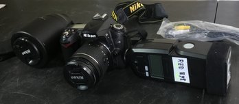 Nikon D90 DSLR, Flash And Additional Lense In Black Carrying Case