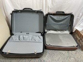 Two Suitcases (one Slightly Smaller)