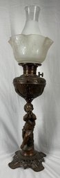 Large Antique Oil Lamp With Cupid Figure