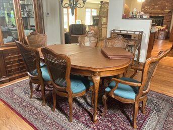 Beautiful Overall Dinner Table With Upholstered Padded Chairs