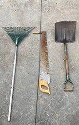 One-man Crosscut Saw Along With Rake And Snow Shovel