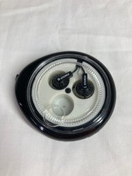 Older Pair Of Rolled Package Earbuds