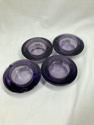 Set Of Purple Glass Candle Holders