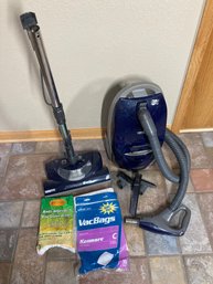 Vacuum Cleaner Along With Supplies