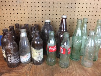 Vintage Glass Bottles Including   5 Green Coke  (1 Clear Coke) & Dark Coors (2 Screw On Lids) (see Photo)