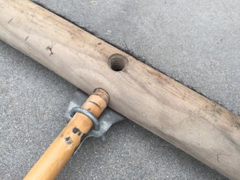 Wood Push Broom With Wood Handle About 5 Feet Long.