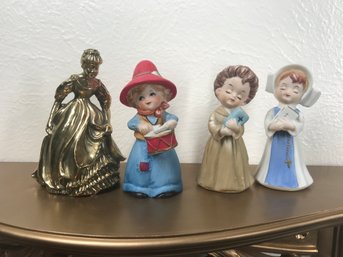 4 Figurines, 1 Golden Lady In Full Dress, 1 Drummer Girl, 2 With Bibles  (shelf Not Included)