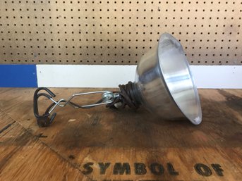 Light  Clamp On Type With Metal Bulb Guard 110 Volt.