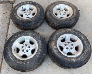 Set Of OEM Jeep Rims With 75R 15 Goodyear Wrangler Tires (See Photos)