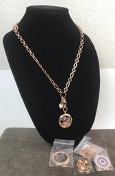 Gold Colored Chain Link Necklace With Assorted Pendants