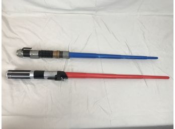 A Lot Of Two 30 Inch Red And Blue Light Saber Toy