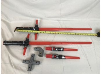 Set Of Two Toy Red Light Sabers With Attachments