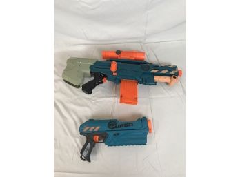 Apartment Of Two Blue Nerf Guns With Attachments