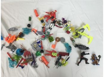 Bag O' Toy Weapons & Random Figures And Accessories