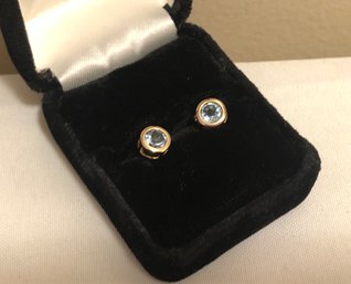 Sterling Silver Blue Topaz Stud Earrings (1.4 Grams)