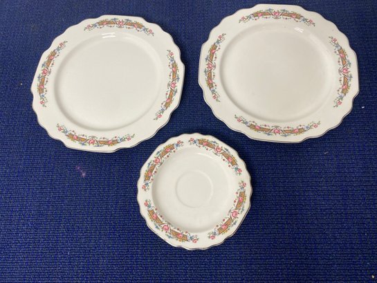 2 Dinner Plates And Saucer