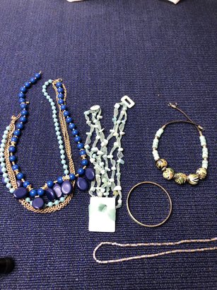 4 Necklaces And 1 Bracelet