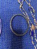 4 Necklaces And A Bracelet