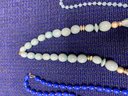 4 Blue Necklaces And A Bracelets