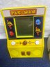 Pac-Man Toy And V For Vendetta Mask