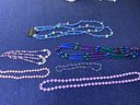 6  Purple Necklaces