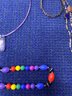 4 Necklaces And A Bracelet