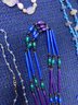 6  Purple Necklaces