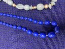 4 Blue Necklaces And A Bracelets