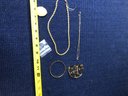 2 Necklaces, 2 Bracelets, And 2 Pendants