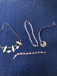 3 Necklaces And A Bracelet