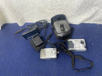 Garmin Nuvi, Battery Charger And 2 Cameras