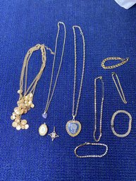 4 Necklaces, 4 Bracelets And 2 Pendants