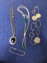 3 Necklaces And A Bracelet