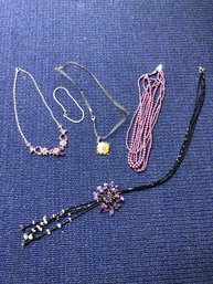 4 Necklaces, 1 Bracelet
