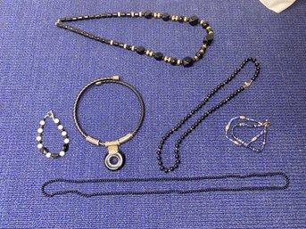 4 Black Necklaces And 2 Bracelets