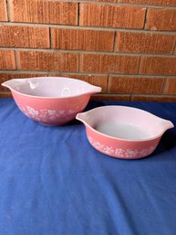 Two Pink And White Pyrex Bowls