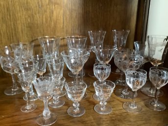 AN ASSORTMENT OF ETCHED GLASSWARE