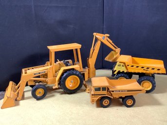 Ertl Backhoe & 2 Remco Dump Trucks