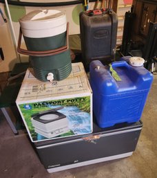 Cooler, Water Jug, Passport Camping Potty, Propane Coleman Lantern, Equipment
