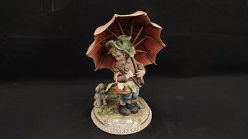Capodimonte Boy With Umbrella Porcelain Figure