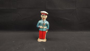 J Chein & Co. Wind-Up Toy Police Officer