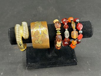 Red And Gold Toned Bracelets