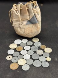 Assortment Of International Coins With Leather Pouch
