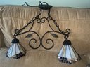 Hanging Iron Accent Lamp Fixture With Two Stained Glass Cone Shaped Shades, 24 Wide
