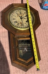 Walnut Schoolhouse Clock W/time, Strike And Calendar And A 'Regulator A' Glass Door, 22' Ht