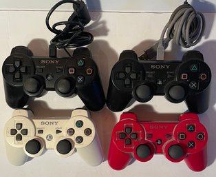 4 SONY Video Game Controllers - See Pics.