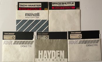 Atari Computer Floppy Discs And SwiftWare Simulator Games As Shown